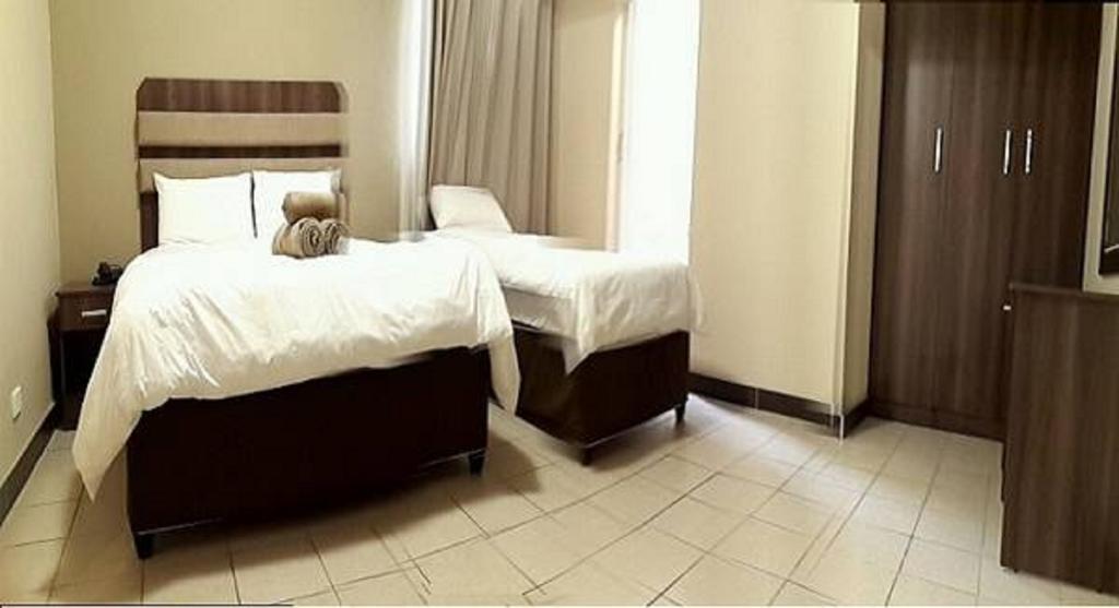 Hotel Cube Durban Quarto foto