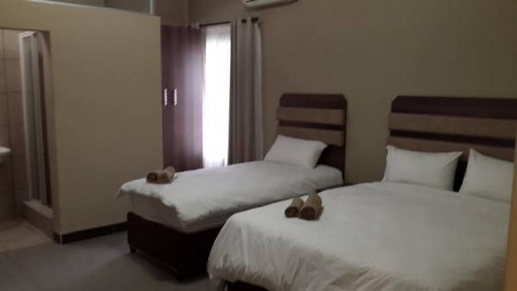 Hotel Cube Durban Quarto foto