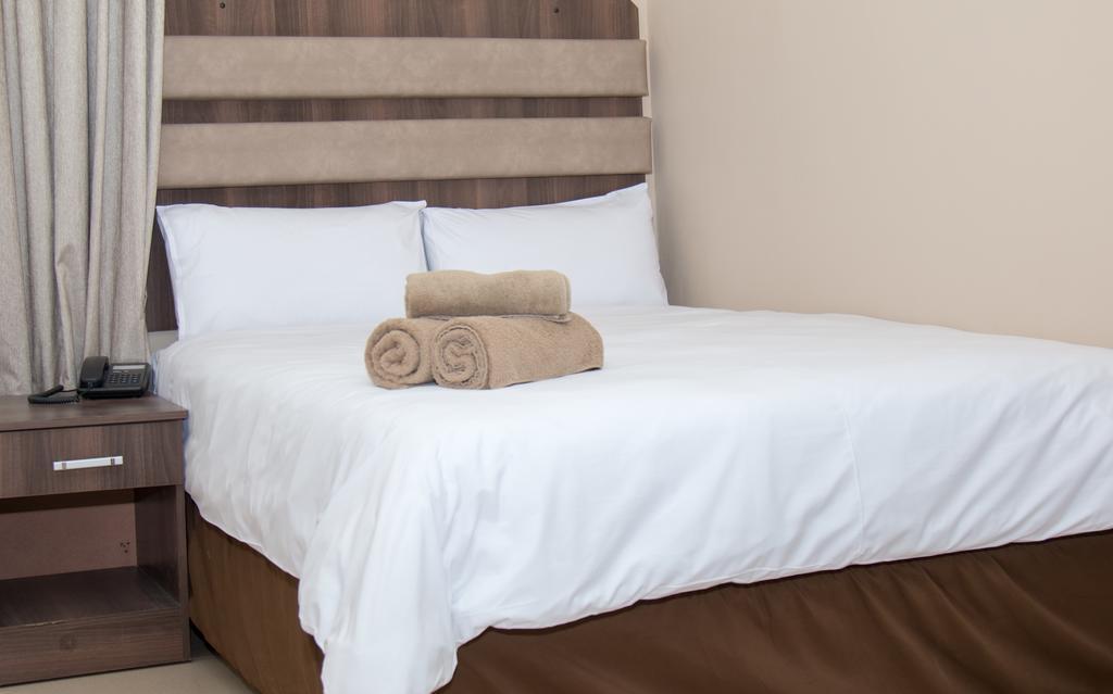 Hotel Cube Durban Quarto foto